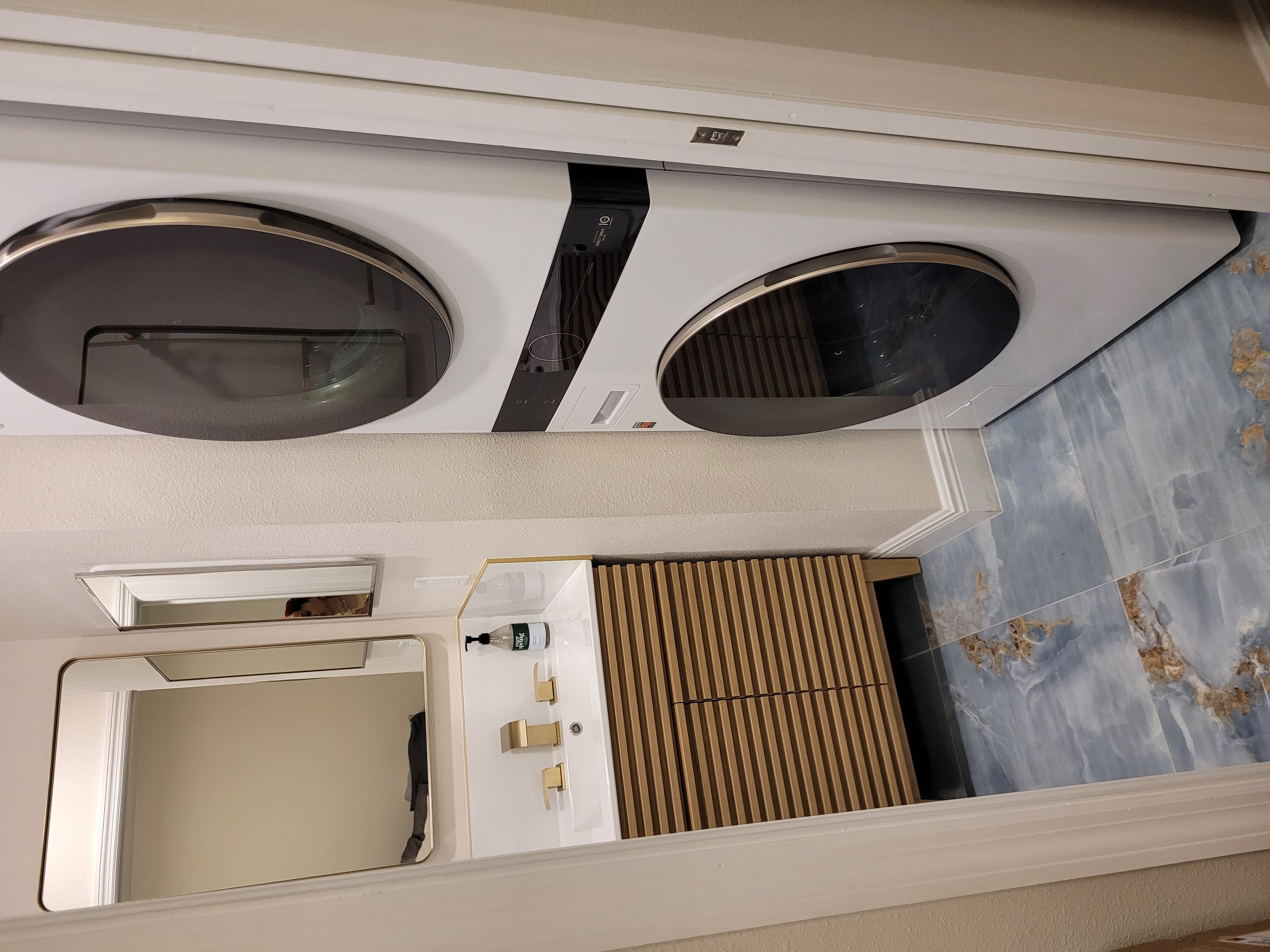 Private laundry closet inside the suite